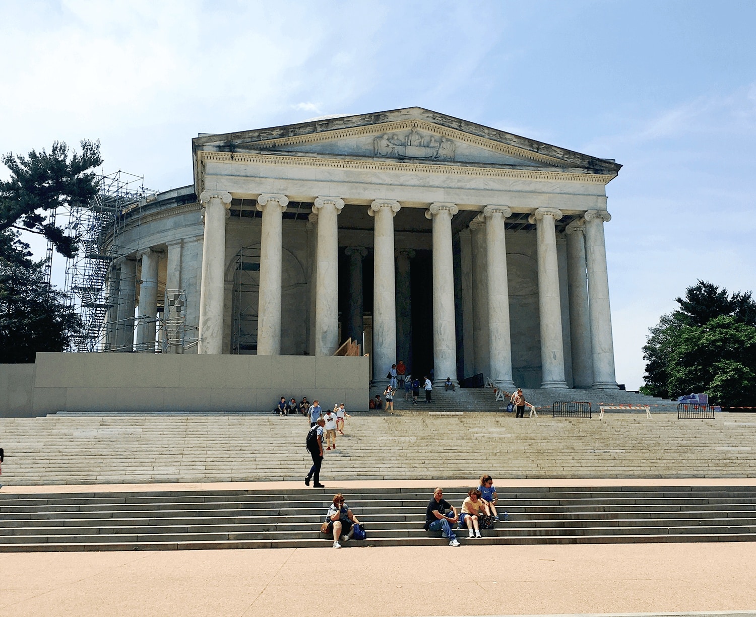 Top 25 Things to Do in Washington, DC: The Best Mostly Free Attractions 15 Thomas Jefferson Memorial in Washington, D.C., USA, featuring people sitting outside of the domed rotunda and white marble columns, a notable landmark on an American history tour.