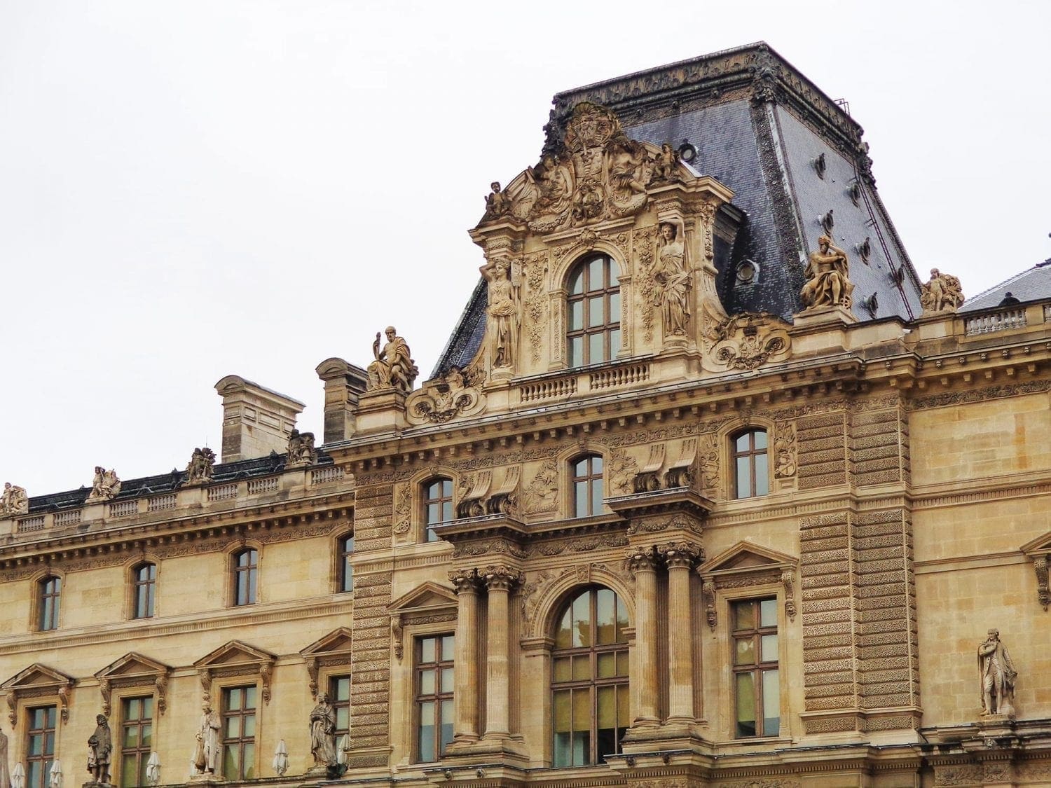 25 of the Best Things to Do in Paris That (Mostly) Won't Break the Bank 7 The Louvre Exterior