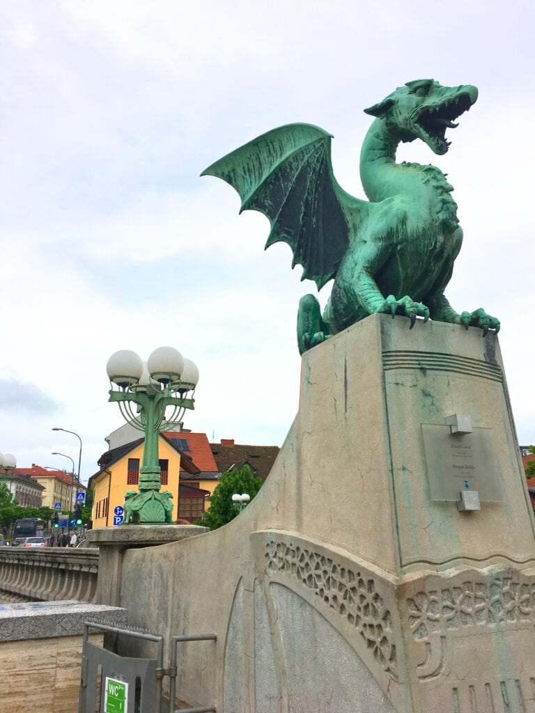 18 of the Best Things to Do in Slovenia: Your Ultimate Travel Guide 4 Historic Dragon Bridge in Ljubljana, Slovenia, showcasing intricate dragon sculptures.