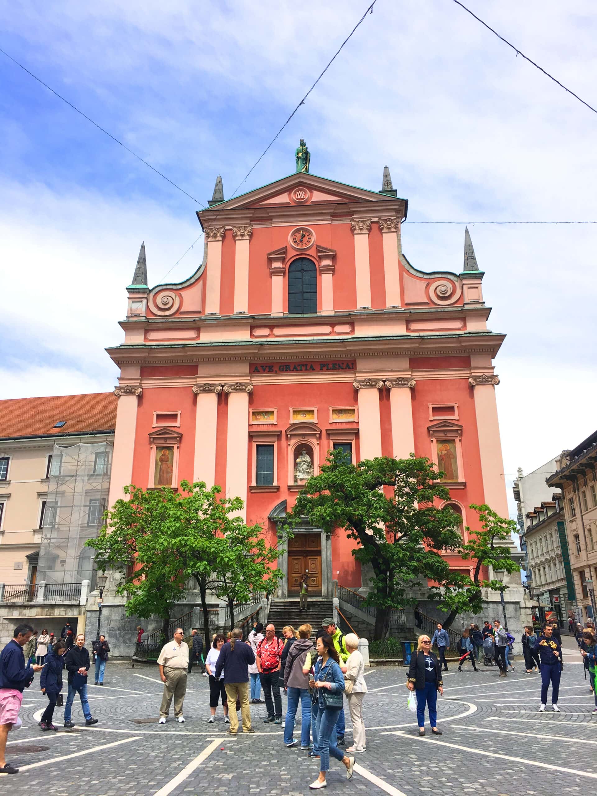 18 of the Best Things to Do in Slovenia: Your Ultimate Travel Guide 6 Franciscan Church of the Annunciation at Prešeren Square in Ljubljana