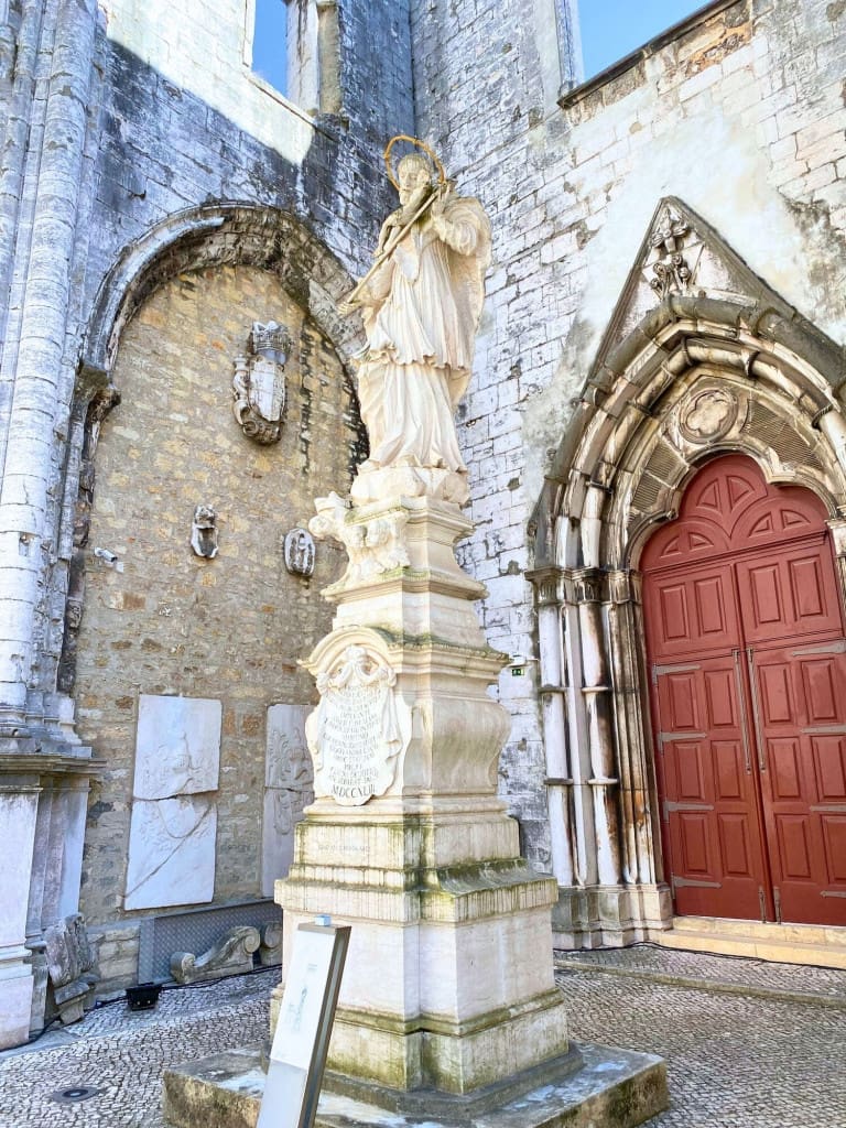 3-Day Lisbon, Portugal Itinerary: A Budget-Friendly Plan + Map 20 Statue at the Carmo Archaeology Museum Convent in Lisbon Portugal