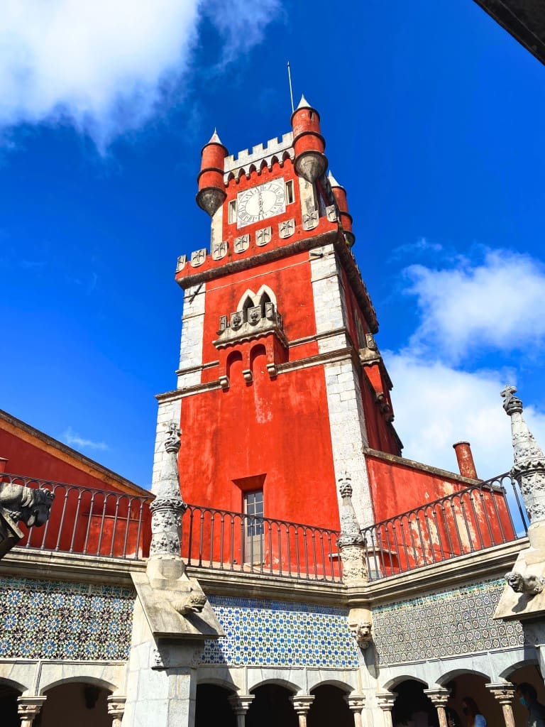 The Top Things to Do in Sintra: 5 Stunning Palaces You Need to See 13 clock tower courtyard pena palace sintra