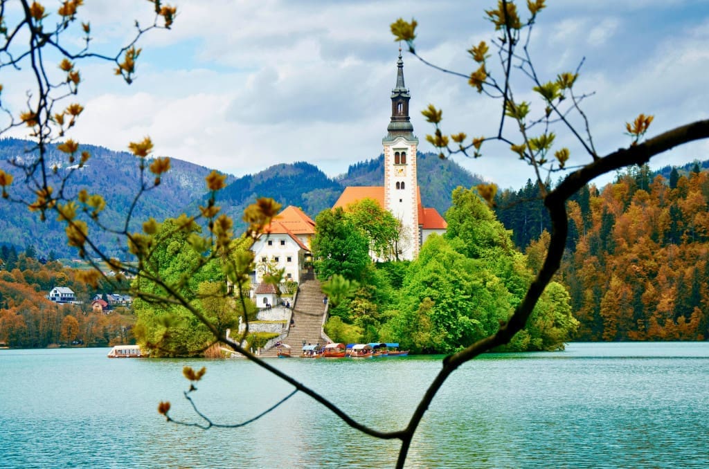 18 of the Best Things to Do in Slovenia: Your Ultimate Travel Guide 10 lake bled slovenia church assumption mary