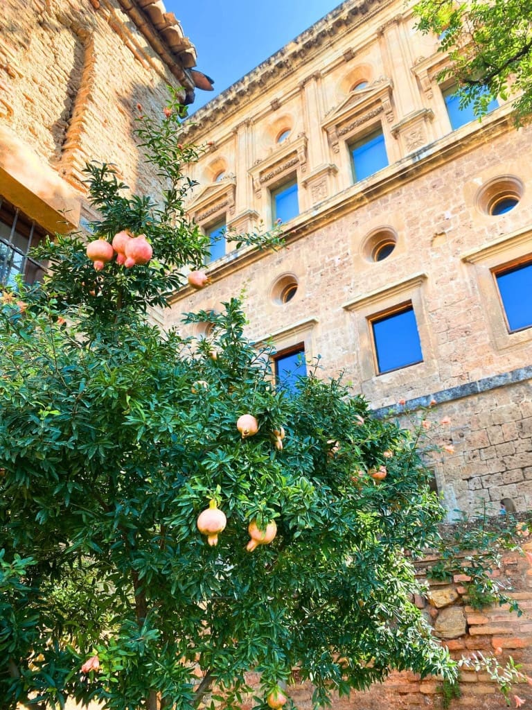 Is Granada, Spain, Worth Visiting? Yes, Here's How I Took a Day Trip 25 pomegranates palace of charles v granada