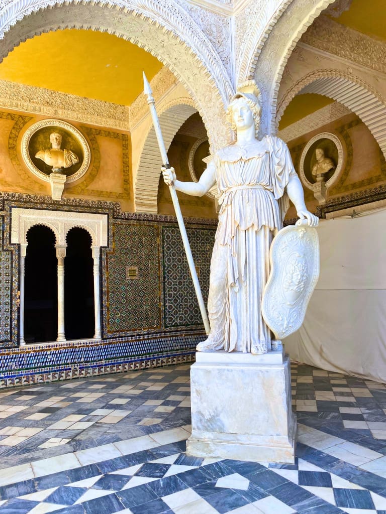 14 of the Top Things to Do in Seville, Spain, on Your First Trip 31 statue athena la casa de pilatos seville
