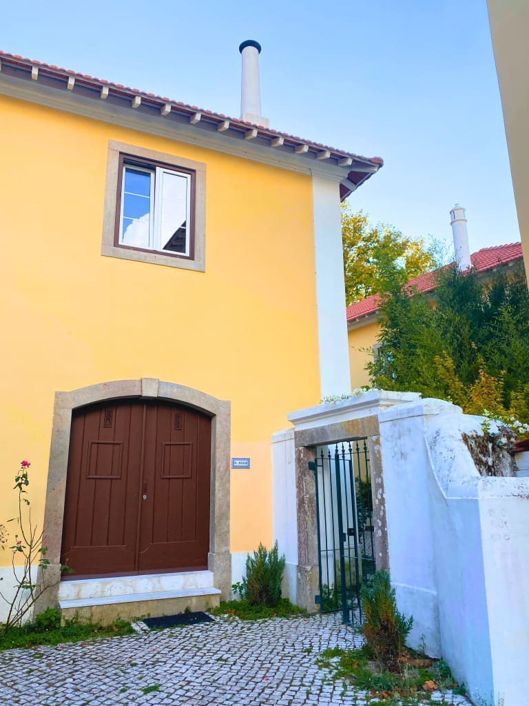 The Top Things to Do in Sintra: 5 Stunning Palaces You Need to See 4 yellow facade casa do vinho sintra guesthouse