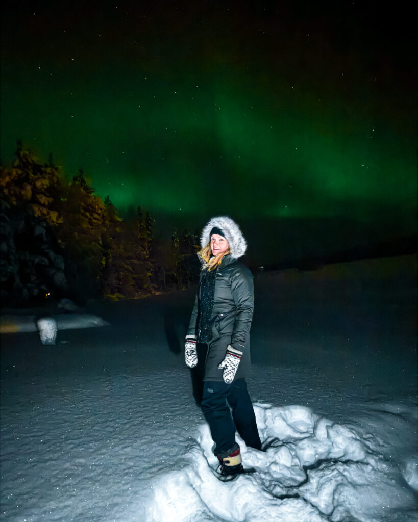 Guide to Spotting the Aurora Borealis in Rovaniemi, Finland 17 aurora woman snow