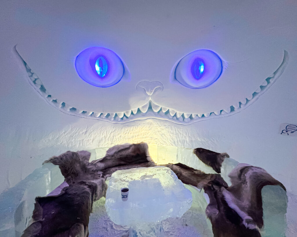 Rovaniemi in Winter: How to Build a First-Timer's Itinerary for Finnish Lapland 107 cheshire cat ice bar sculpture in snowman world