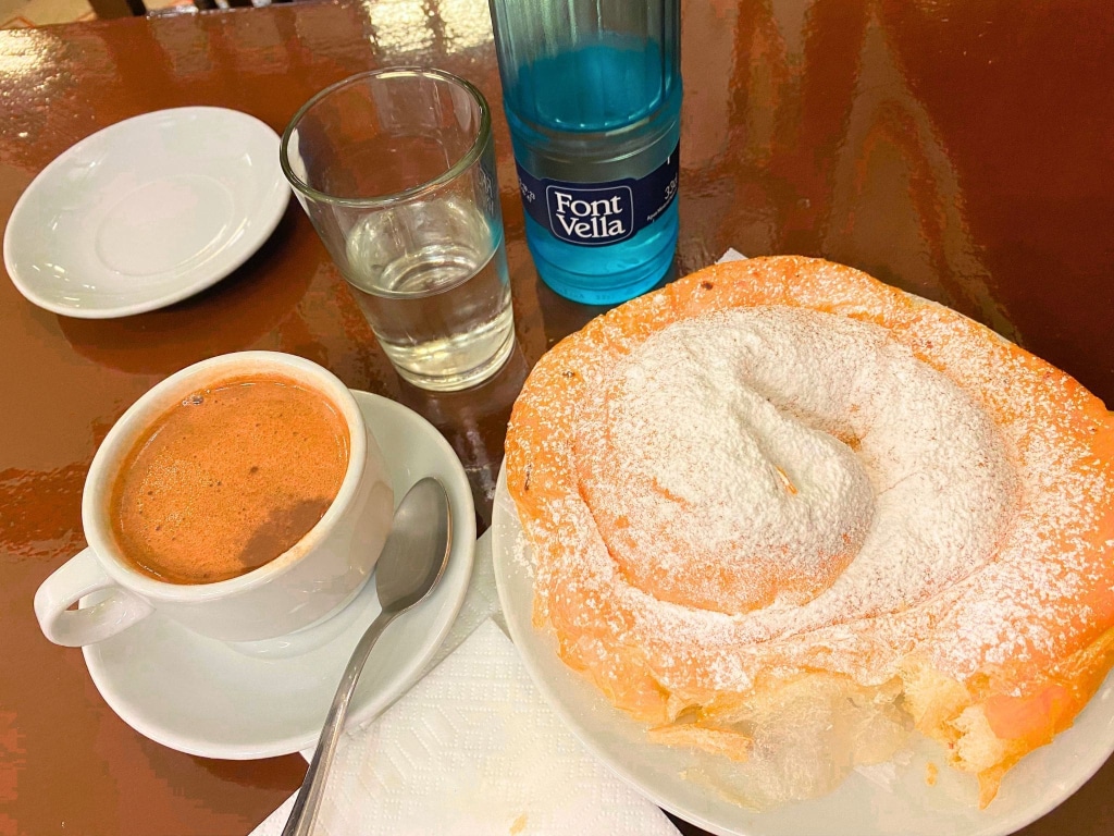 How to Spend 3 Days in Barcelona: A First-Timer's Travel Itinerary 74 ensaimada pastry coffee water granja dulcinea barcelona