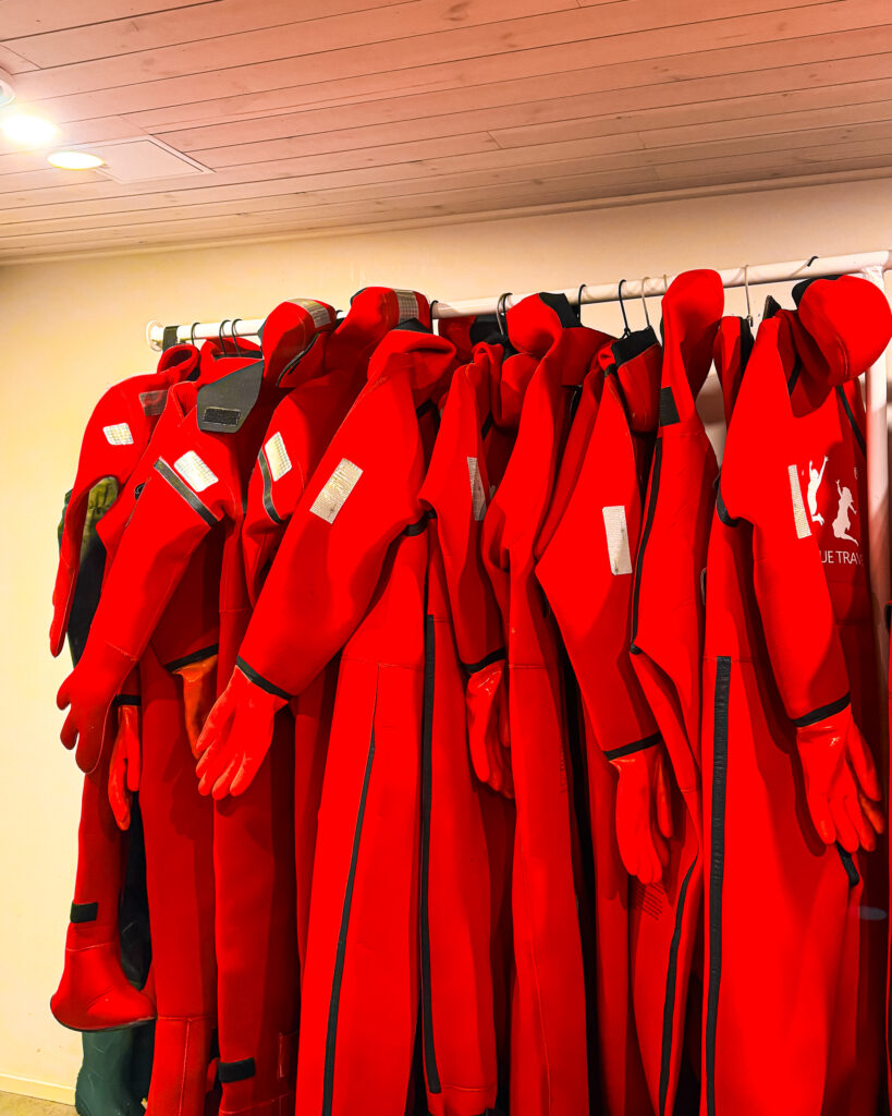 Rovaniemi in Winter: How to Build a First-Timer's Itinerary for Finnish Lapland 30 ice floating red suits