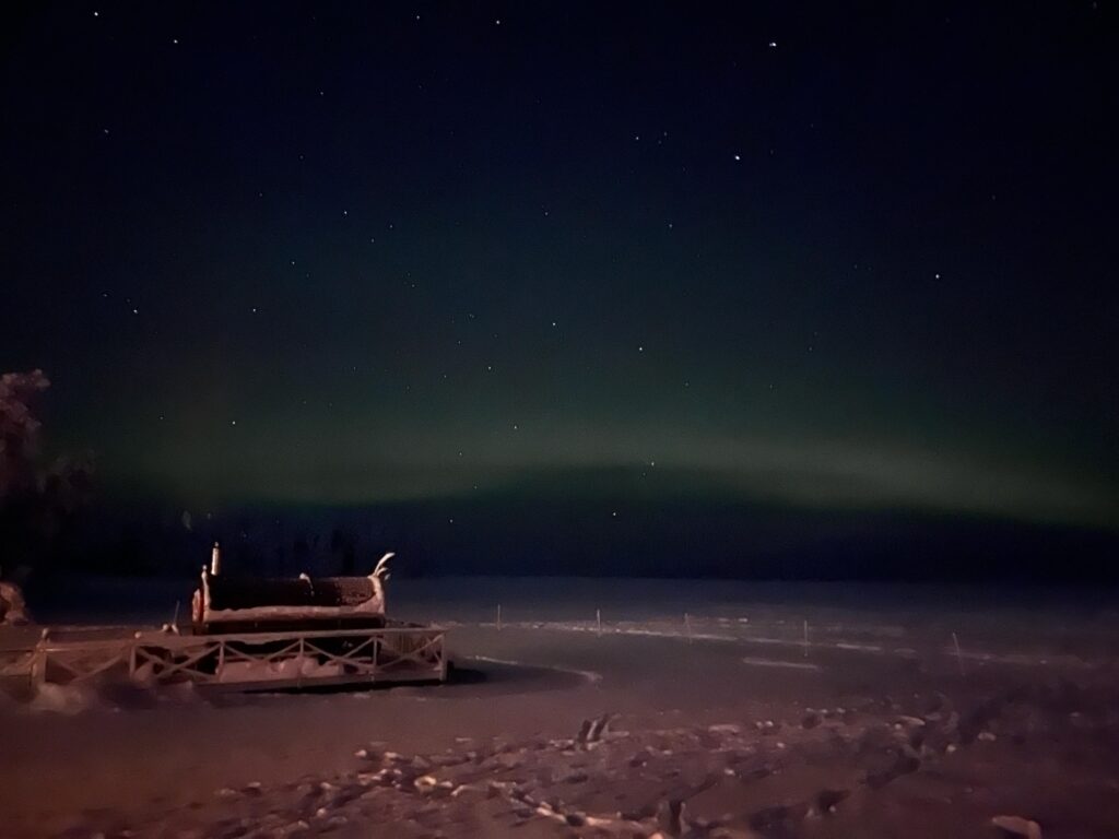 Guide to Spotting the Aurora Borealis in Rovaniemi, Finland 3 northern lights lake night
