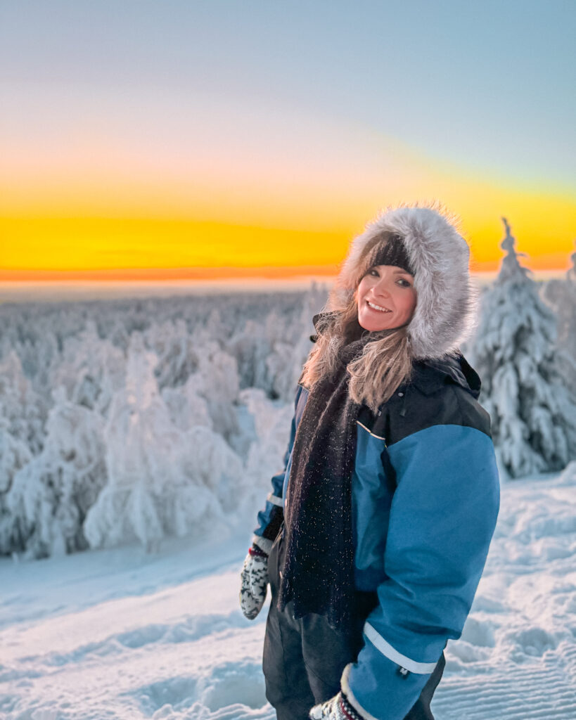 Rovaniemi in Winter: How to Build a First-Timer's Itinerary for Finnish Lapland 27 snowshoeing woman rovaniemi sunset