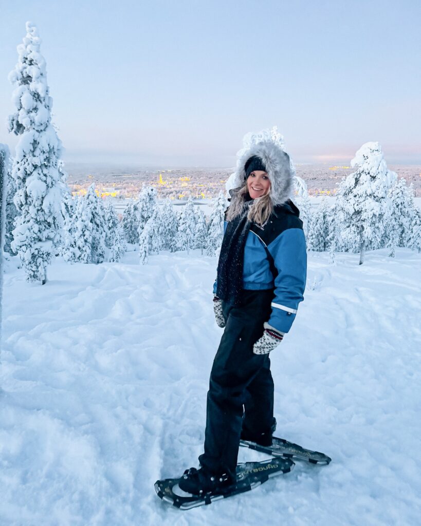 Rovaniemi in Winter: How to Build a First-Timer's Itinerary for Finnish Lapland 25 woman snowshoeing rovaniemi winter