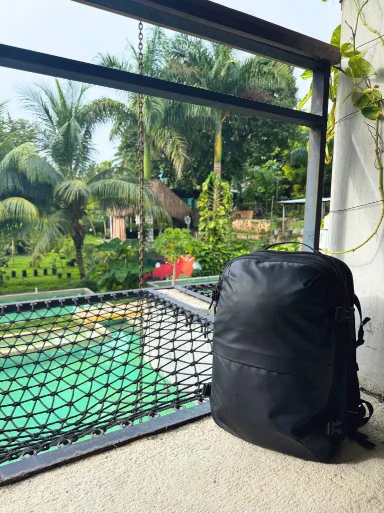 What's the Best Work and Travel Backpack? My Top Pick for Digital Nomads 10 black voyage travel backpack balcony pool palms