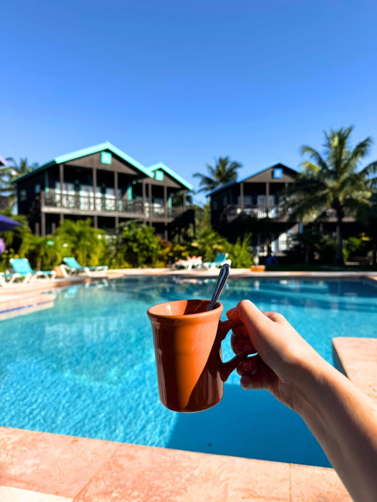 X'tan Ha Resort: Review of My Stay at Ambergris Caye, Belize's Hidden Gem 23 coffee mug swimming pool x tan ha resort ambergris caye belize