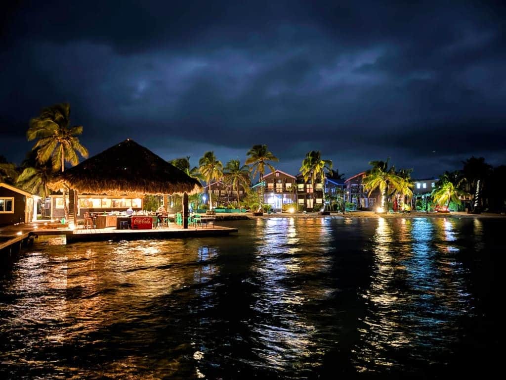 X'tan Ha Resort: Review of My Stay at Ambergris Caye, Belize's Hidden Gem 18 palapa bar night waterfront x tan ha resort ambergris caye belize