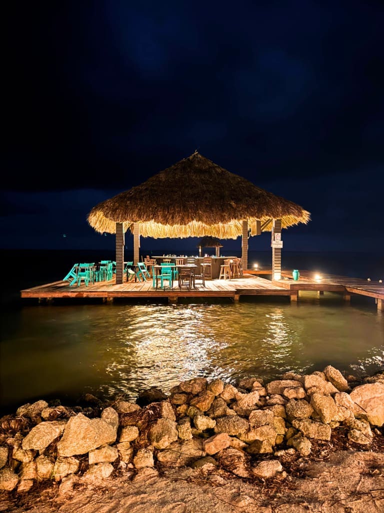 X'tan Ha Resort: Review of My Stay at Ambergris Caye, Belize's Hidden Gem 15 palapa bar night x tan ha resort ambergris caye belize