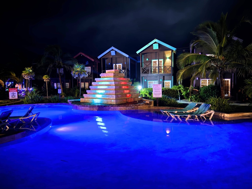 X'tan Ha Resort: Review of My Stay at Ambergris Caye, Belize's Hidden Gem 19 pool pyramid night x tan ha resort ambergris caye belize