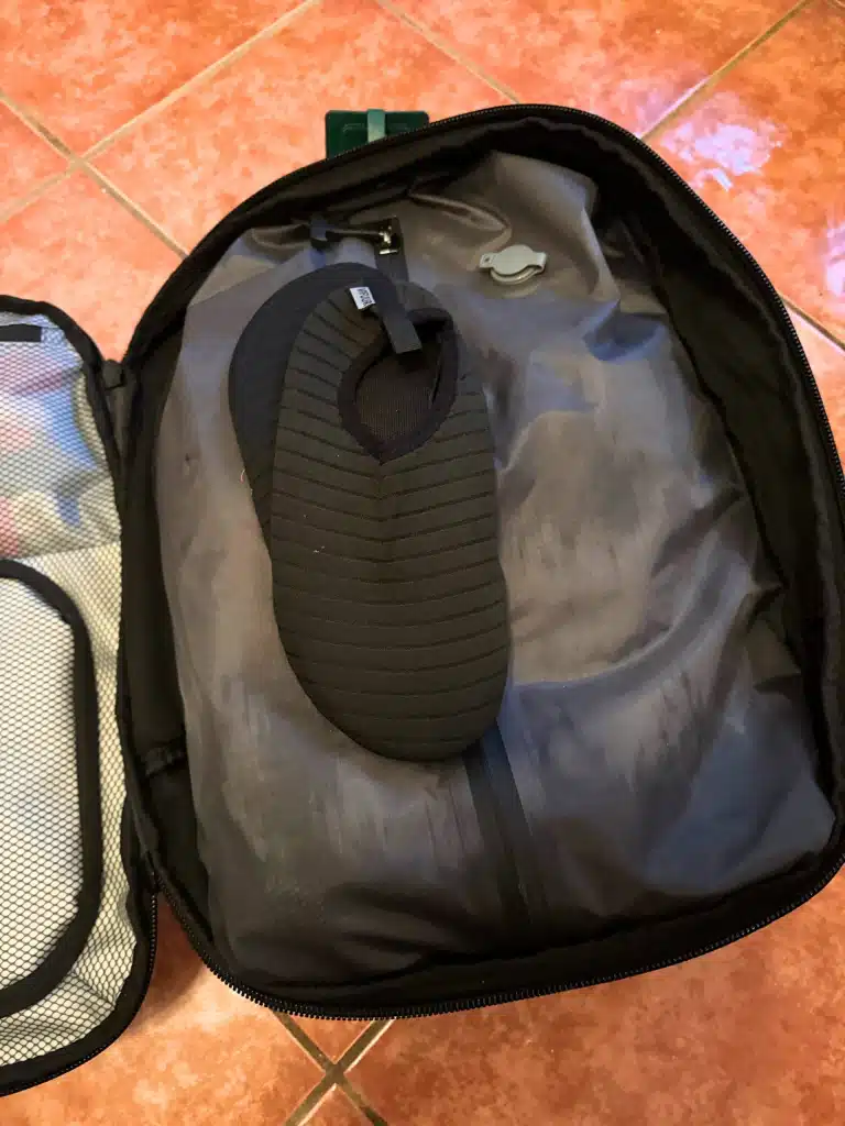 What's the Best Work and Travel Backpack? My Top Pick for Digital Nomads 4 water shoes vacuum compression black voyage travel backpack